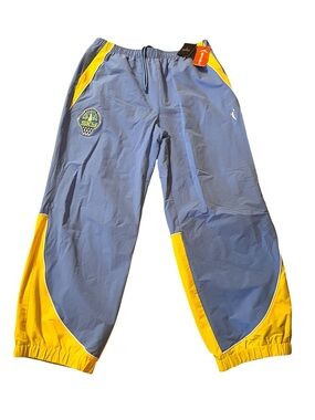 WNBA Chicago Sky Blue/Yellow OVO x Track Pants
Large. NWT
Retail $229